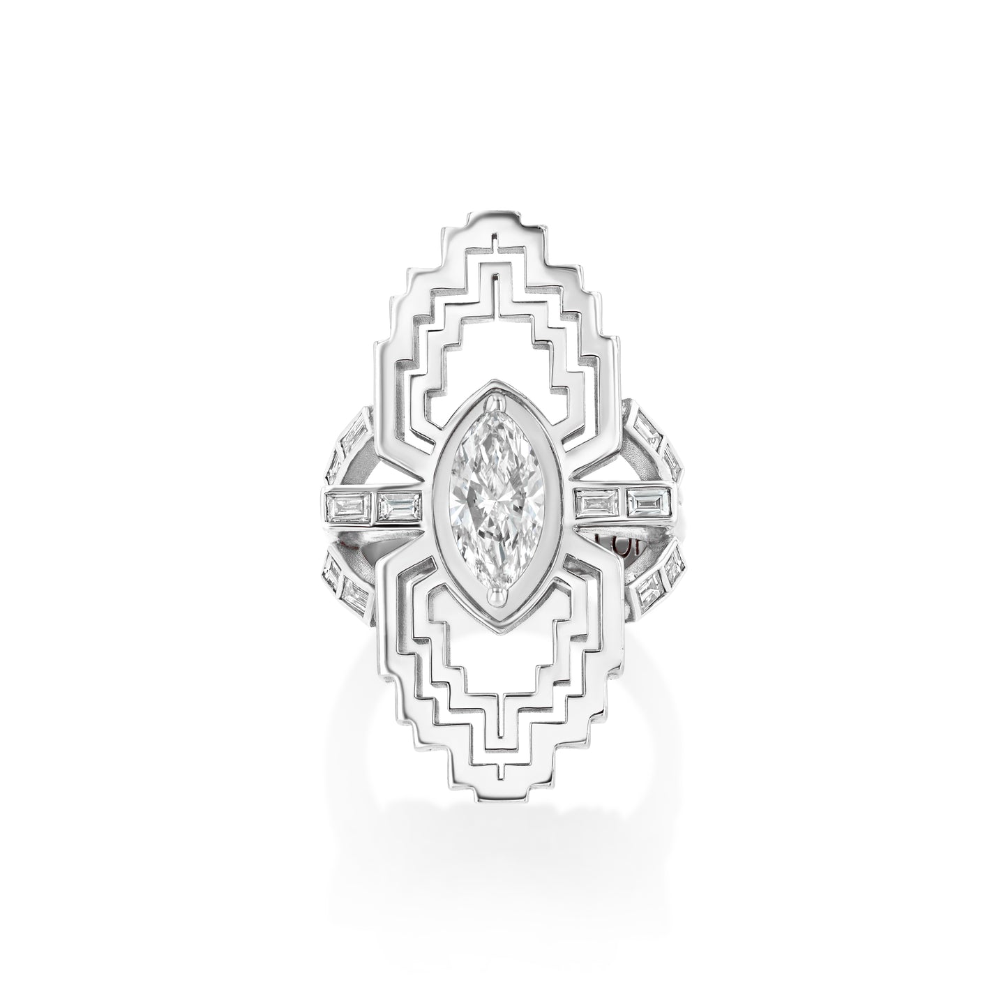 A marquise-shaped diamond ring with baguette stones set in a geometric pattern on the arms of the ring, crafted in 18k recycled gold.