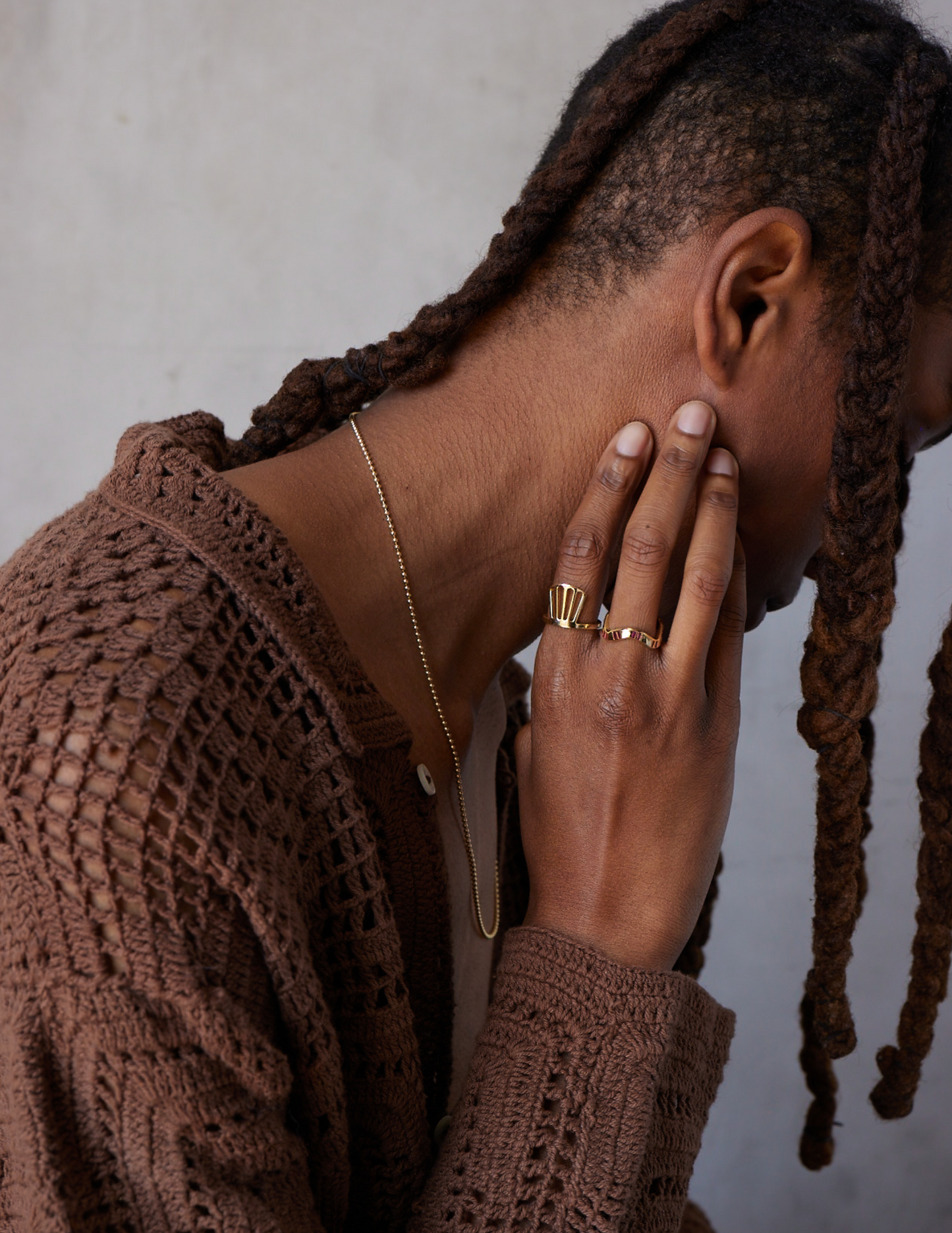 wavey stacking ring with solid yellow gold aand rubies