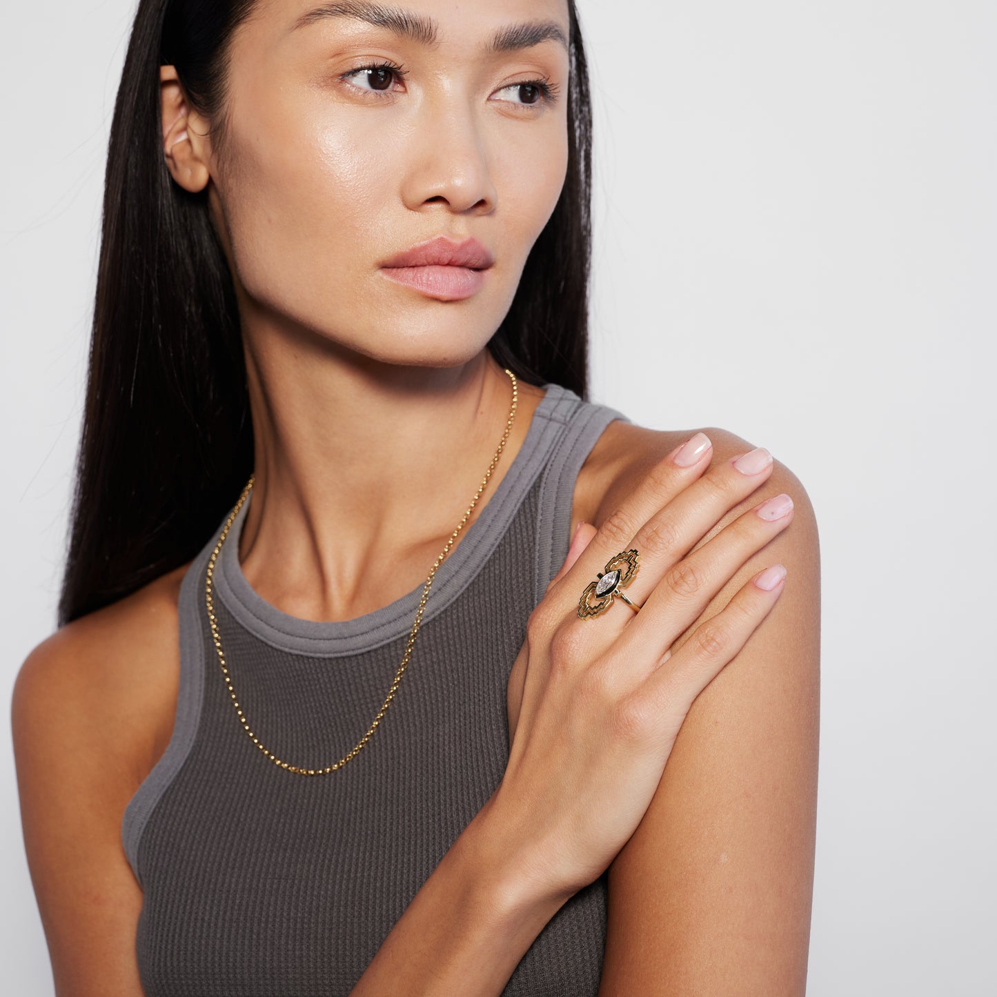 a female model wearing a maruise diamond ring
