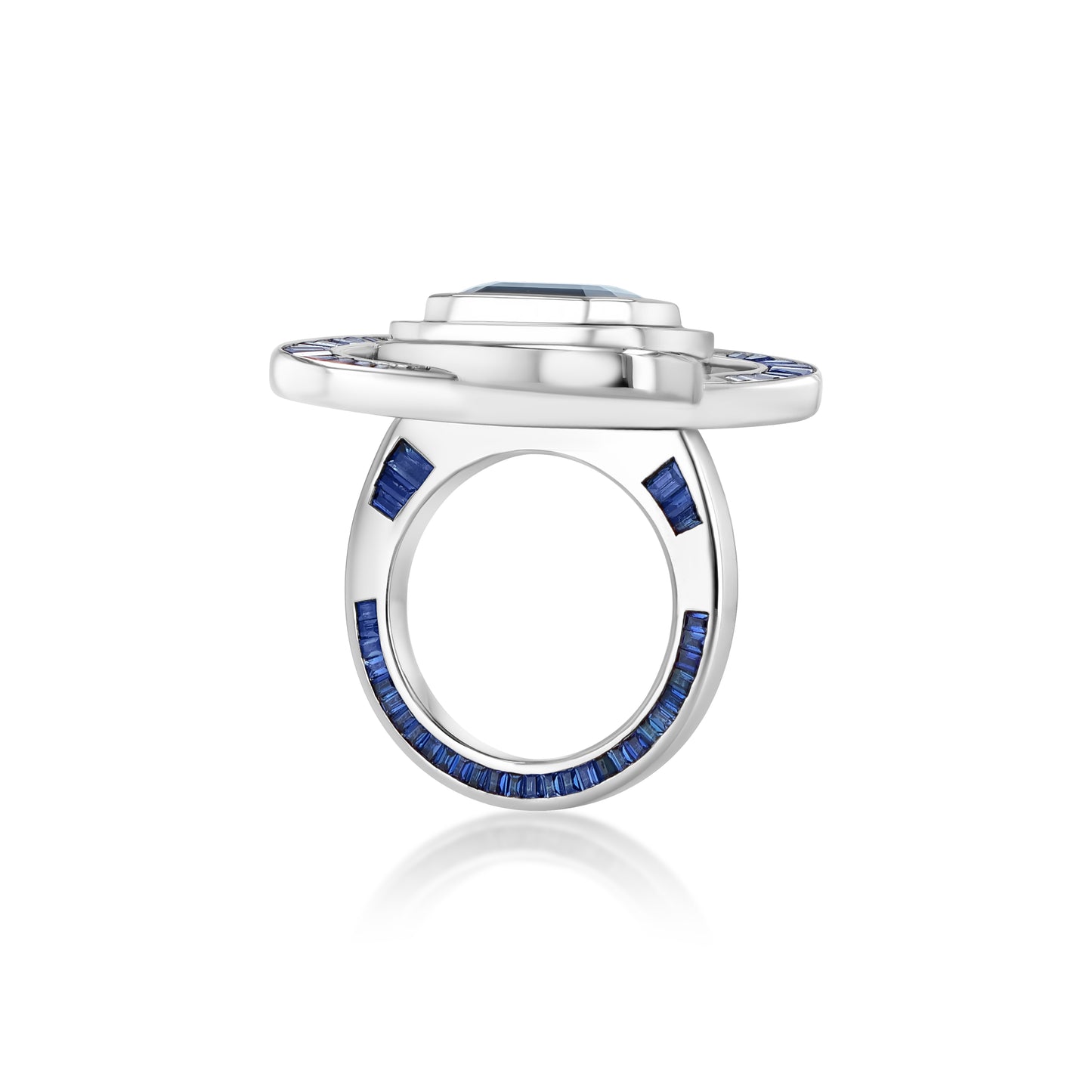 A LÖF statement ring in 18k solid white gold, with custom cut sapphires and blue spinel