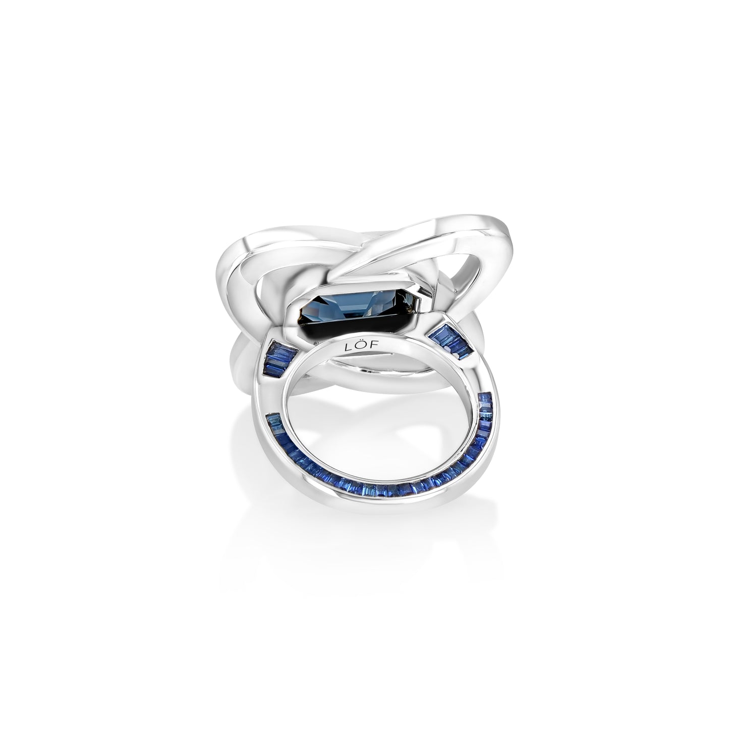 A LÖF statement ring in 18k solid white gold, with custom cut sapphires and blue spinel
