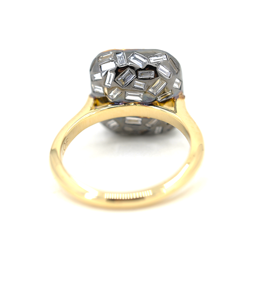 underside of ring - blackened gold set with diamond baguettes