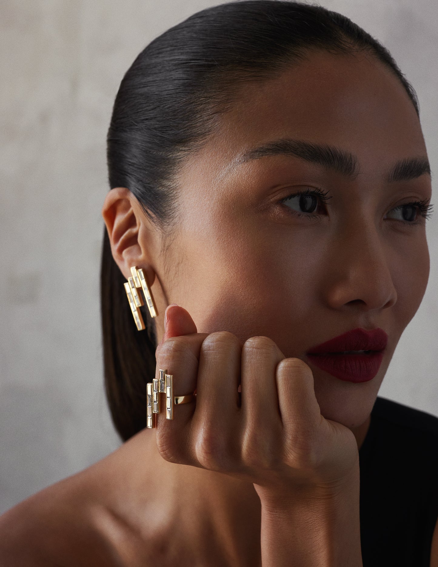 The Tallulah earrings-18k solid yellow gold set with 8 carats of baguette diamond drop down studs and 3.5 carat diamond ring