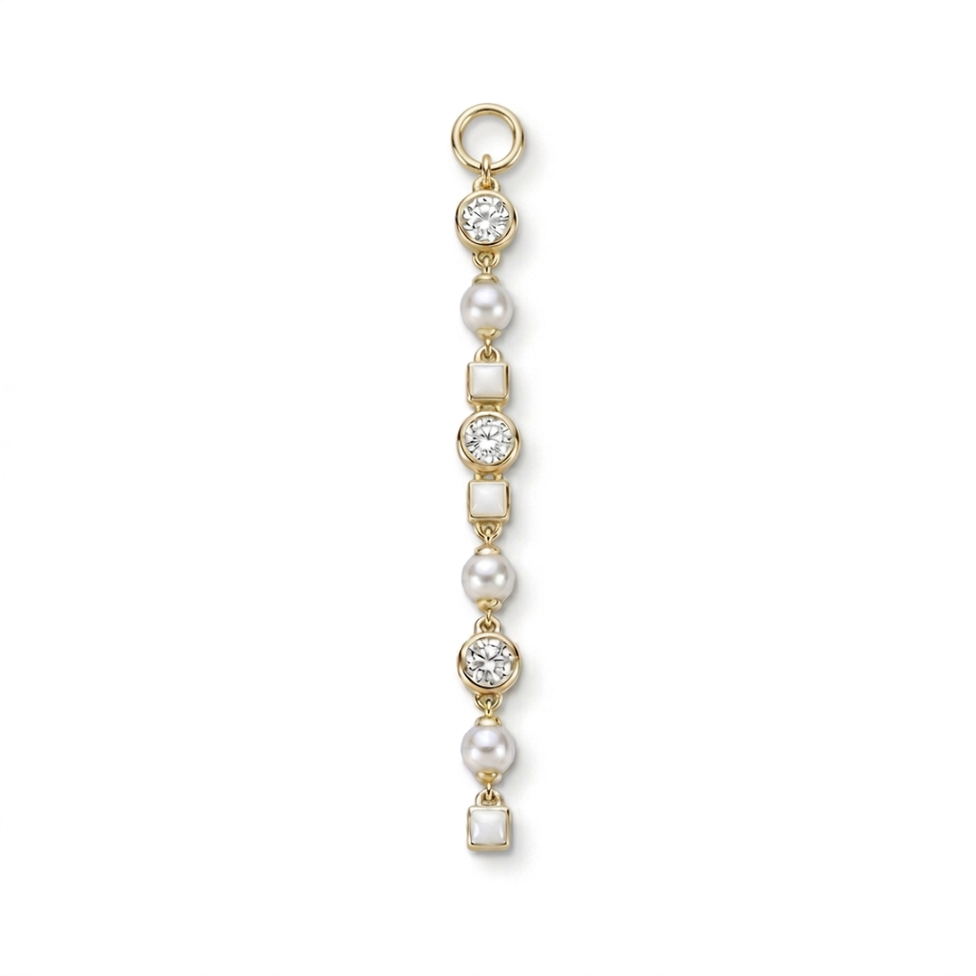 A gold-plated dangle charm featuring alternating round white pearls and square milky white stones, accented by round diamonds in gold bezel settings, shown on a plain white background.