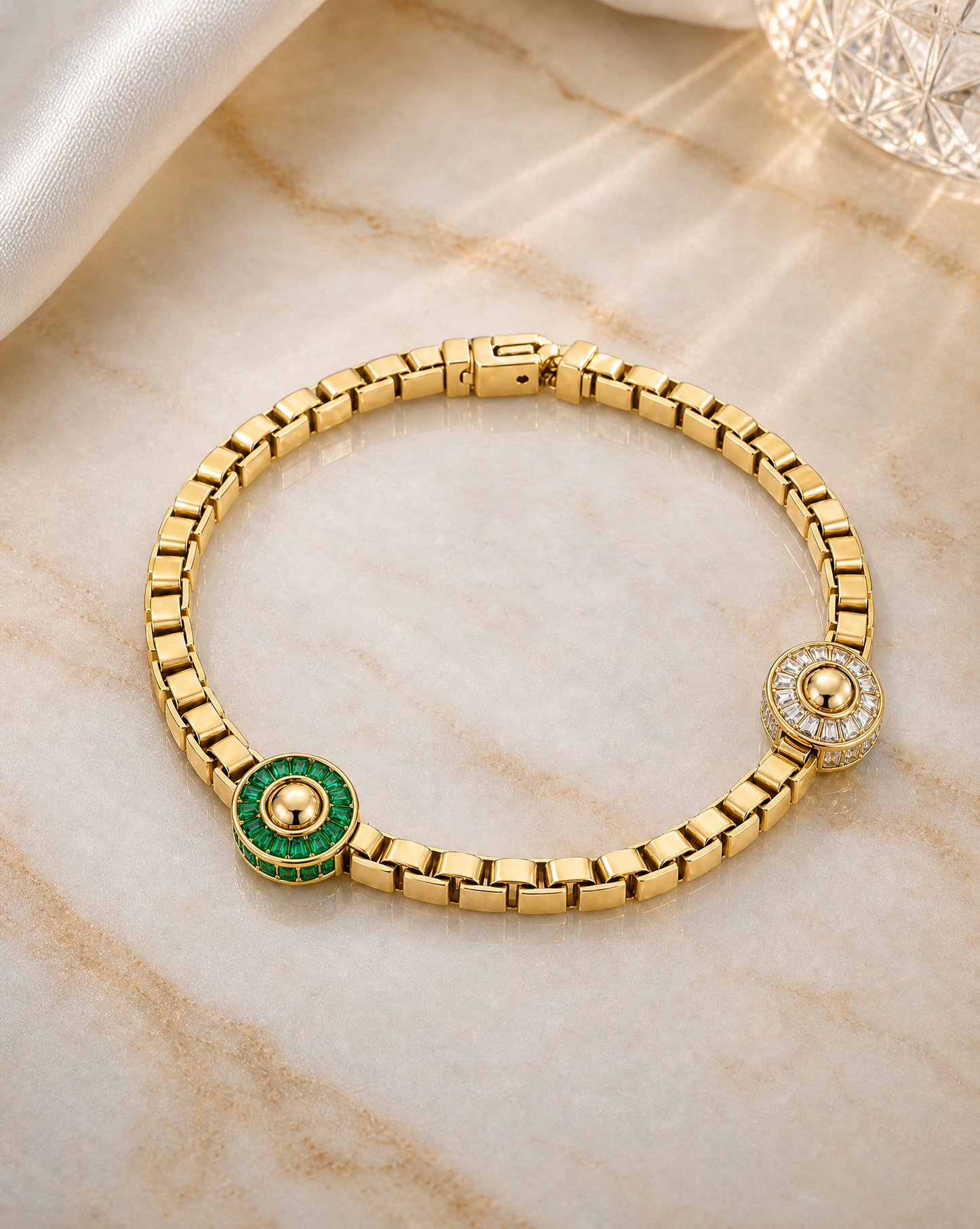 gold necklace with emerald and diamond baguettes