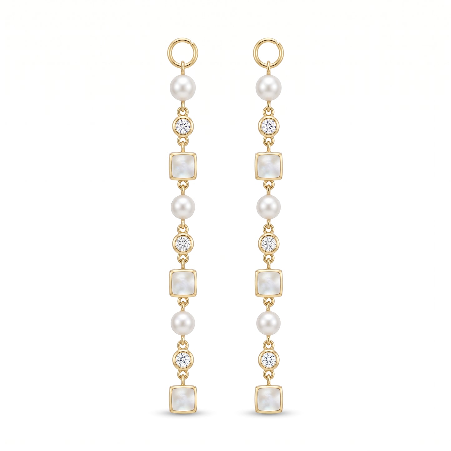 A pair of gold drop earrings featuring white pearls, square pearl-like beads, and old european cut diamonds, shown on a plain white background.