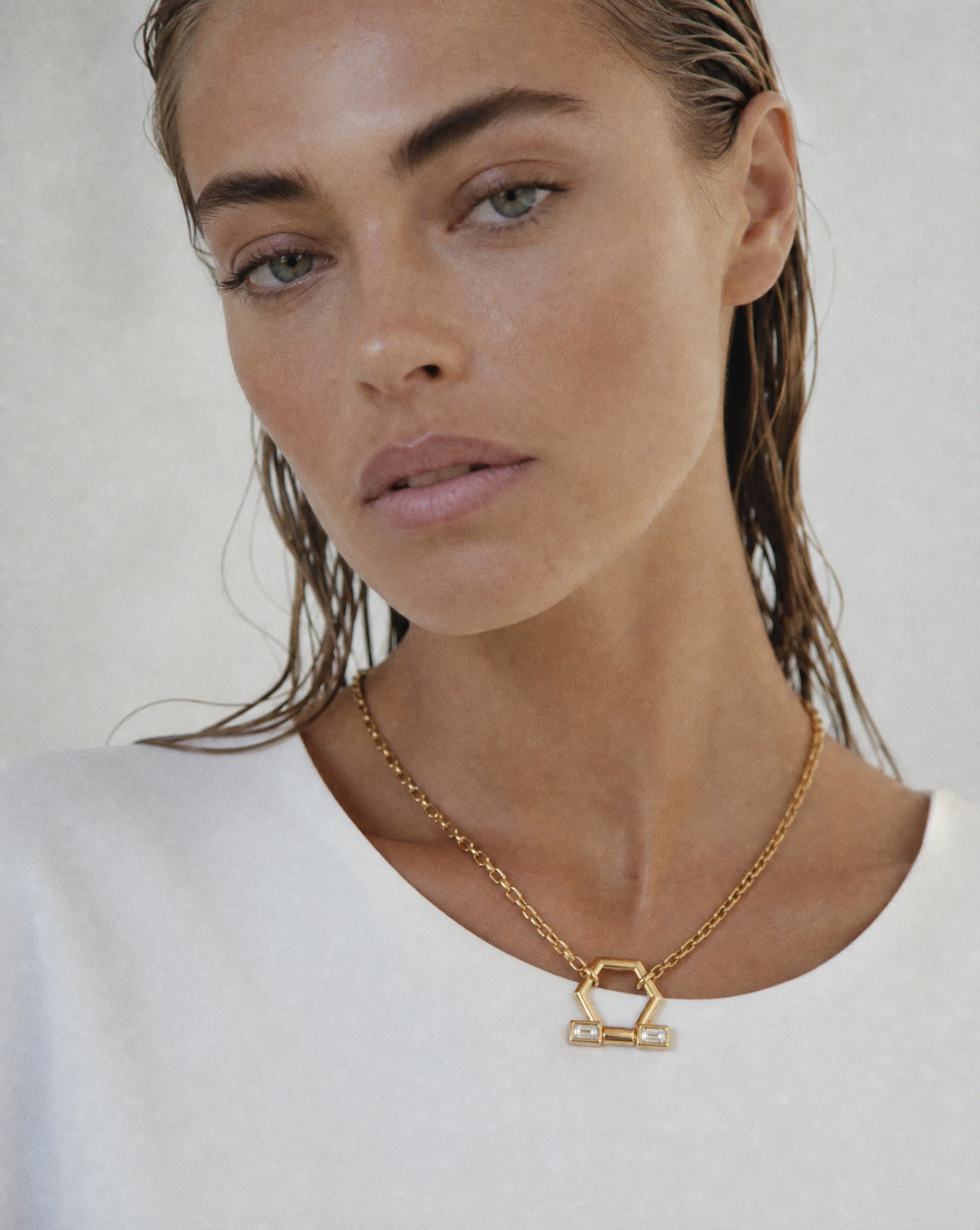 gold and diamond baguette necklace in 18k gold
