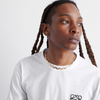 a male model wearing an 18k Gold chain link necklace on a white background