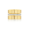 Gold ring with diamond band on a white background
