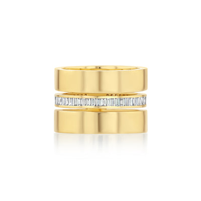 Gold ring with diamond band on a white background