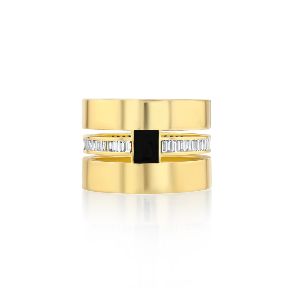 A thick cigar band ring with a hand-painted black enamel and gold square, set with baguette diamonds.