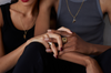 His and her matching triple band cigar band rings with baguette diamonds and black enamel 