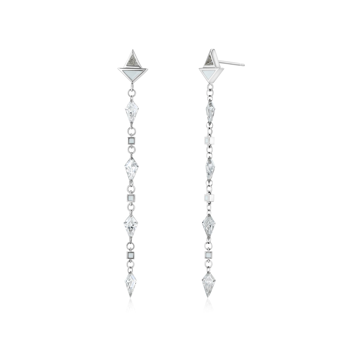 A pair of white gold earrings featuring kite-shaped white diamonds and white enamel details.
