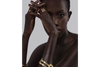 model wearing a multi-band gold cuff