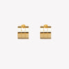 A pair of chunky gold hoop earrings with a geometric design, part of the Margueritte collection.