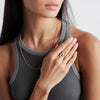 maze motif solid gold ring set with a one carat antique marquise diamond