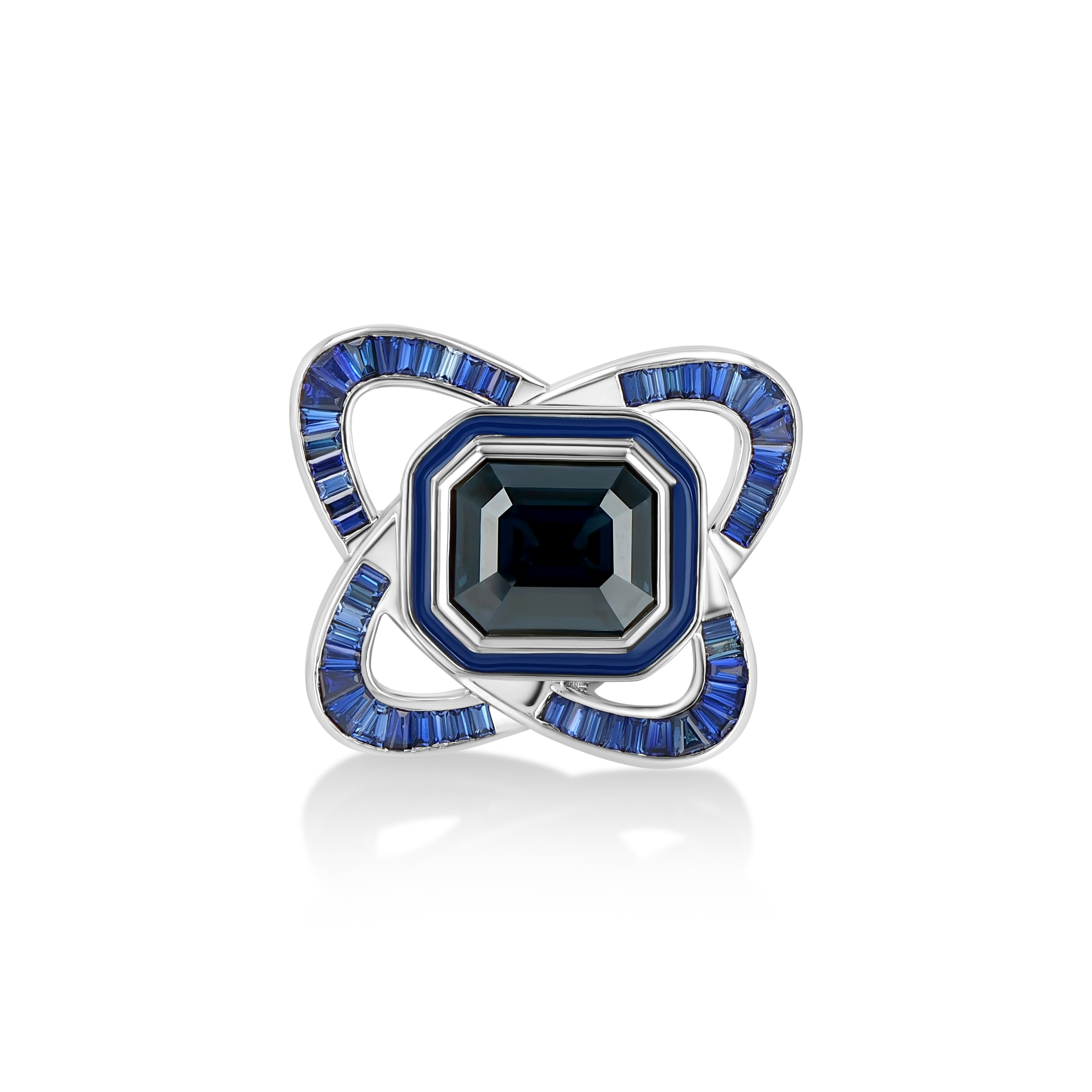 A LÖF statement ring in 18k solid white gold, with custom cut sapphires and blue spinel