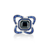 A LÖF statement ring in 18k solid white gold, with custom cut sapphires and blue spinel