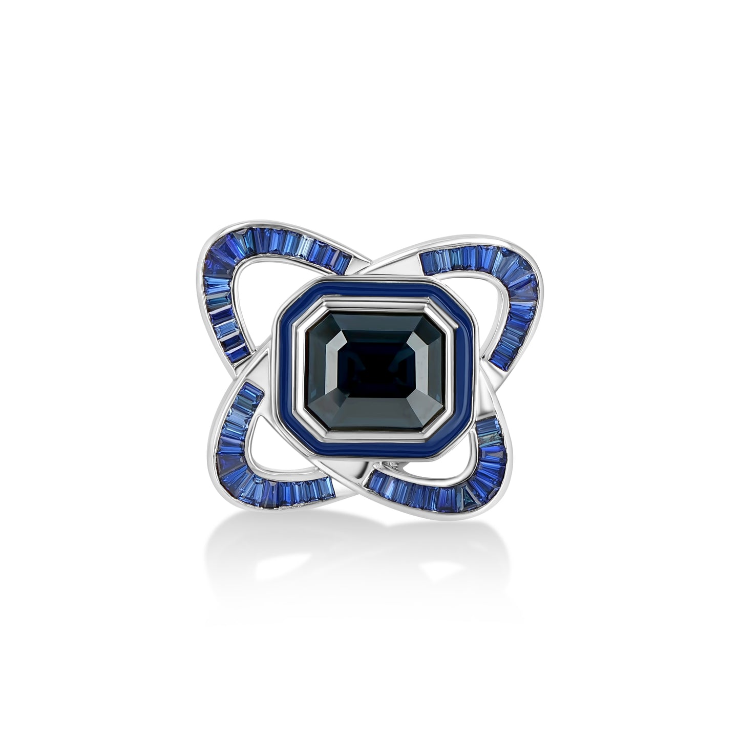 A LÖF statement ring in 18k solid white gold, with custom cut sapphires and blue spinel