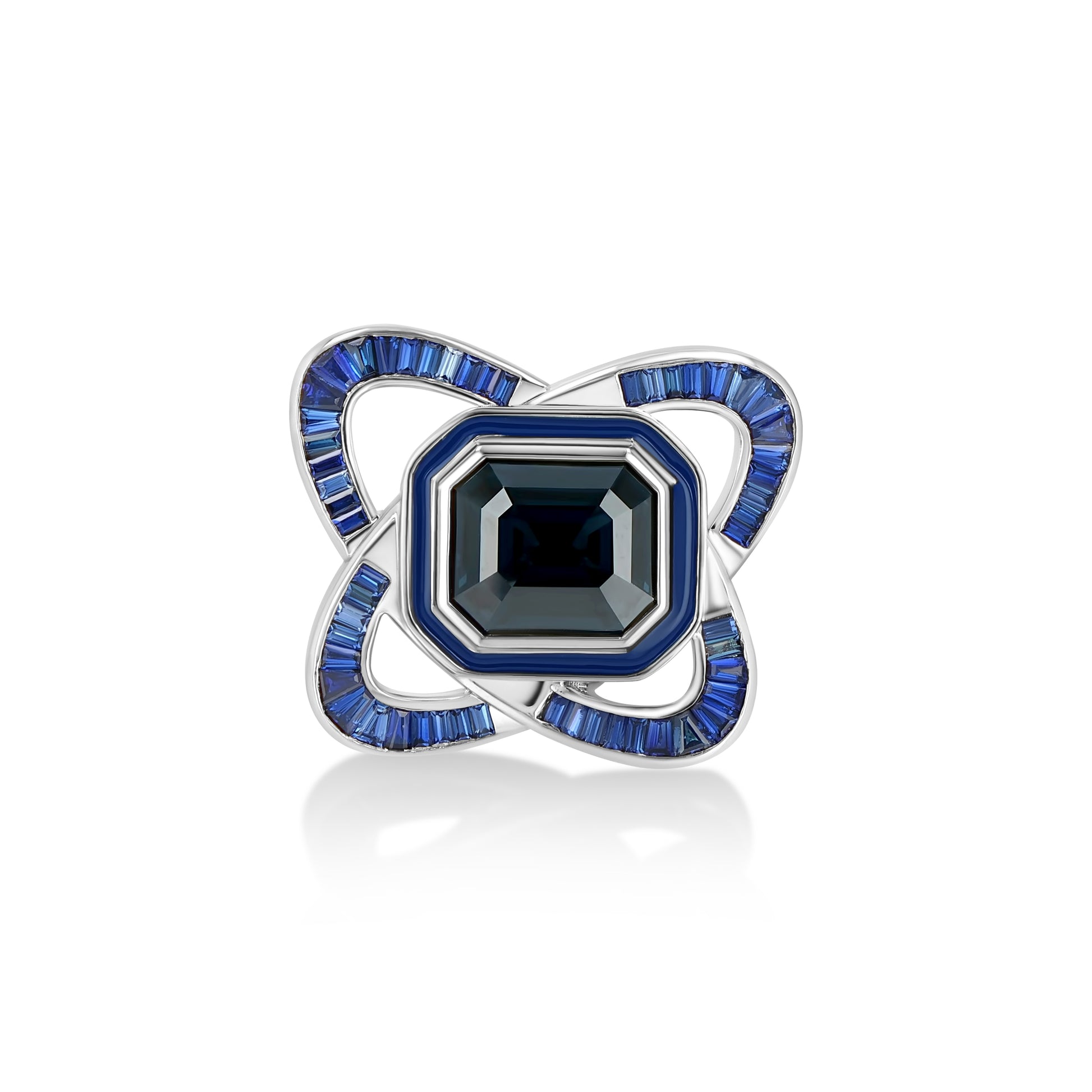 A LÖF statement ring in 18k solid white gold, with custom cut sapphires and blue spinel