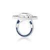 A LÖF statement ring in 18k solid white gold, with custom cut sapphires and blue spinel