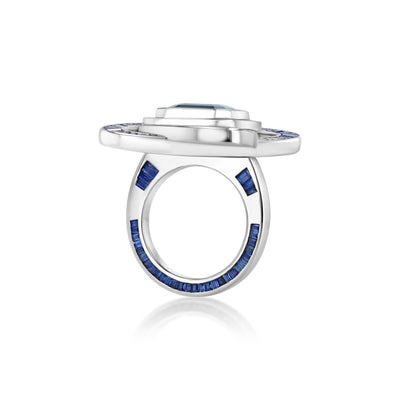 A LÖF statement ring in 18k solid white gold, with custom cut sapphires and blue spinel