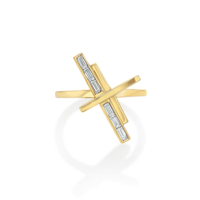 Gold cross-shaped pendant with embedded stones on a white background