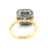 underside of ring - blackened gold set with diamond baguettes