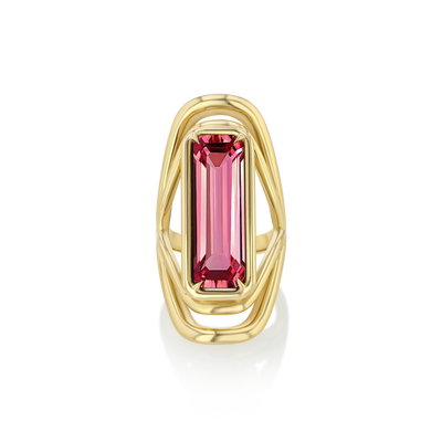 A LÖF gold ring featuring a large green tourmaline stone with a unique swooping band design.