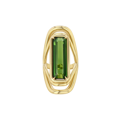 A LÖF gold ring featuring a large green tourmaline stone with a unique swooping band design.