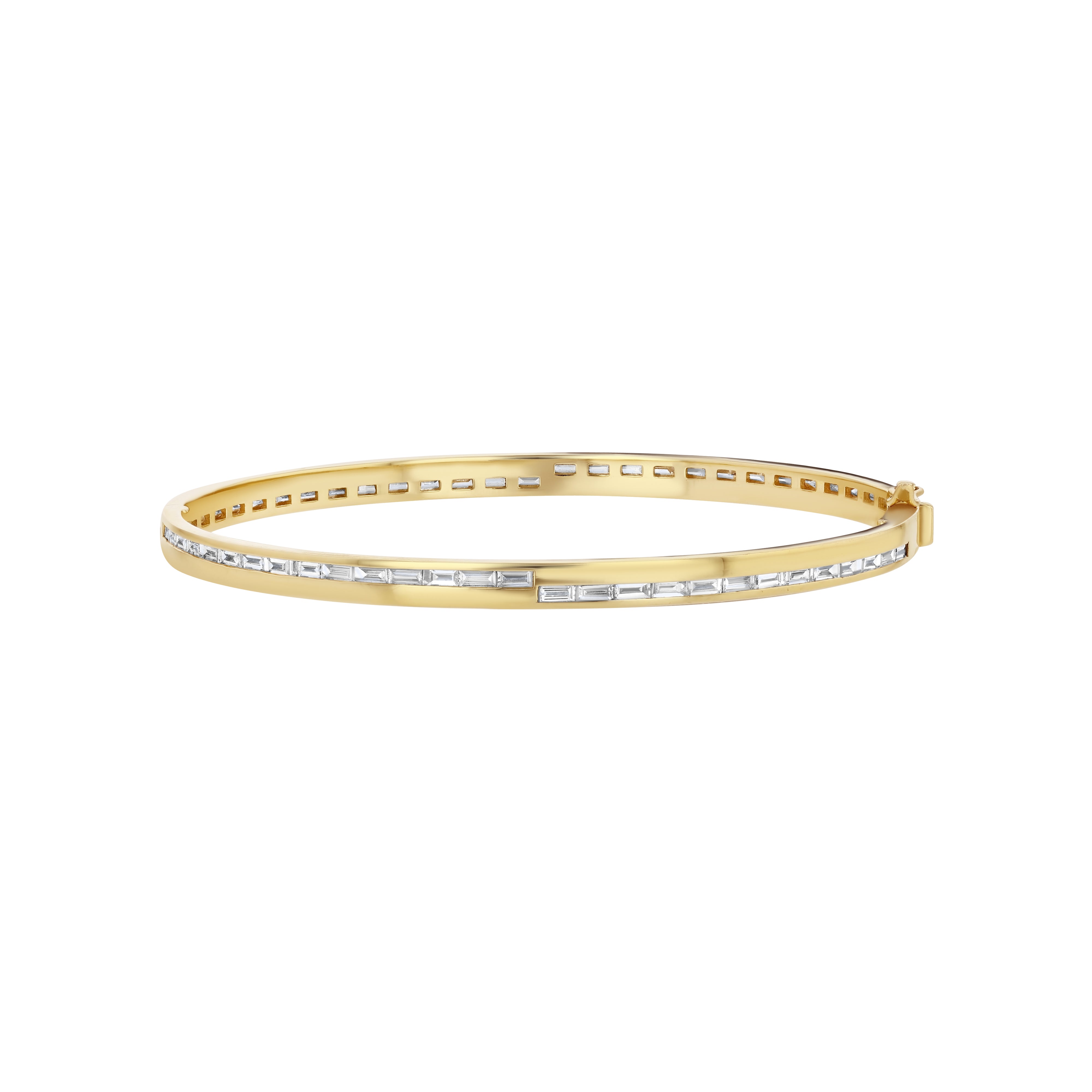 A gold bangle bracelet adorned with baguette-cut diamonds.
