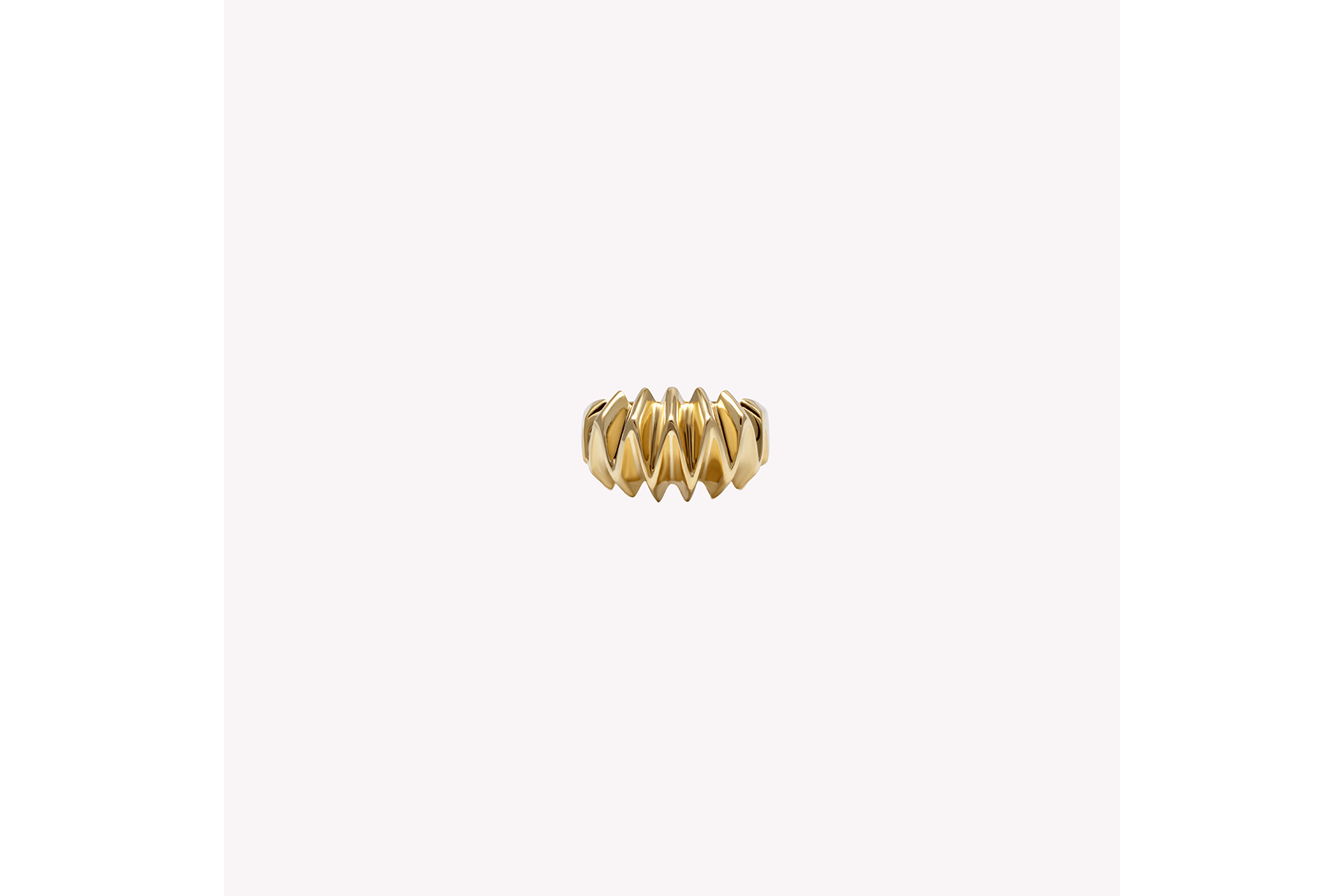 A textured, gold-colored pinky ring ring handcrafted in 18k recycled gold, displayed against a white background.