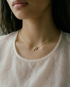 baguette diamonds in 18k gold. chain necklace