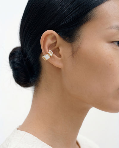 18k gold ear cuff with round diamonds