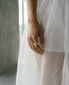 18k gold ring with scrunchie texture set with an antique pear diamond weighing 1 carat
